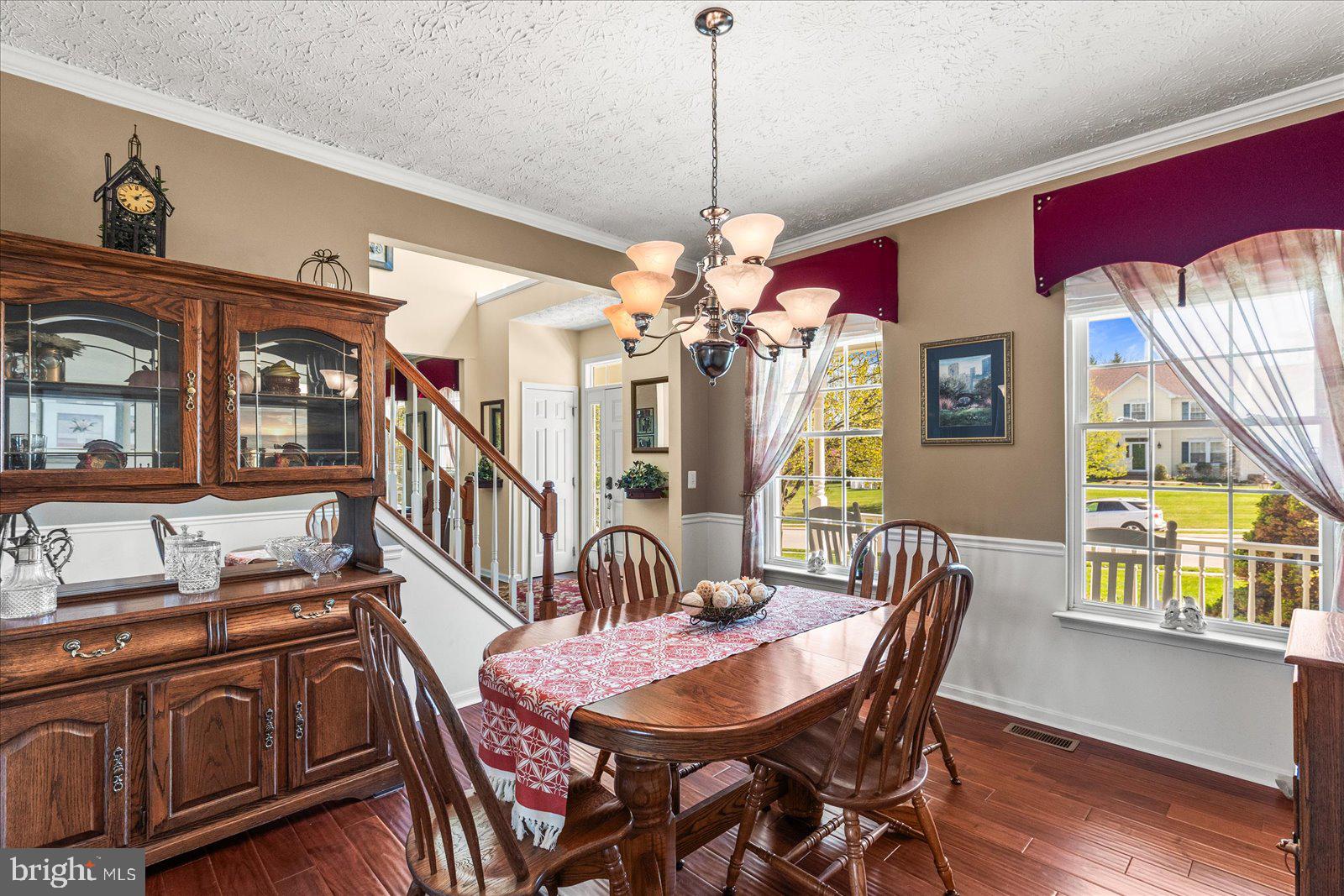 20 Sydney Drive Hanover, PA 17331 - Photo 14 of 73 a view of a dining room with furniture a chandelier and wooden floor