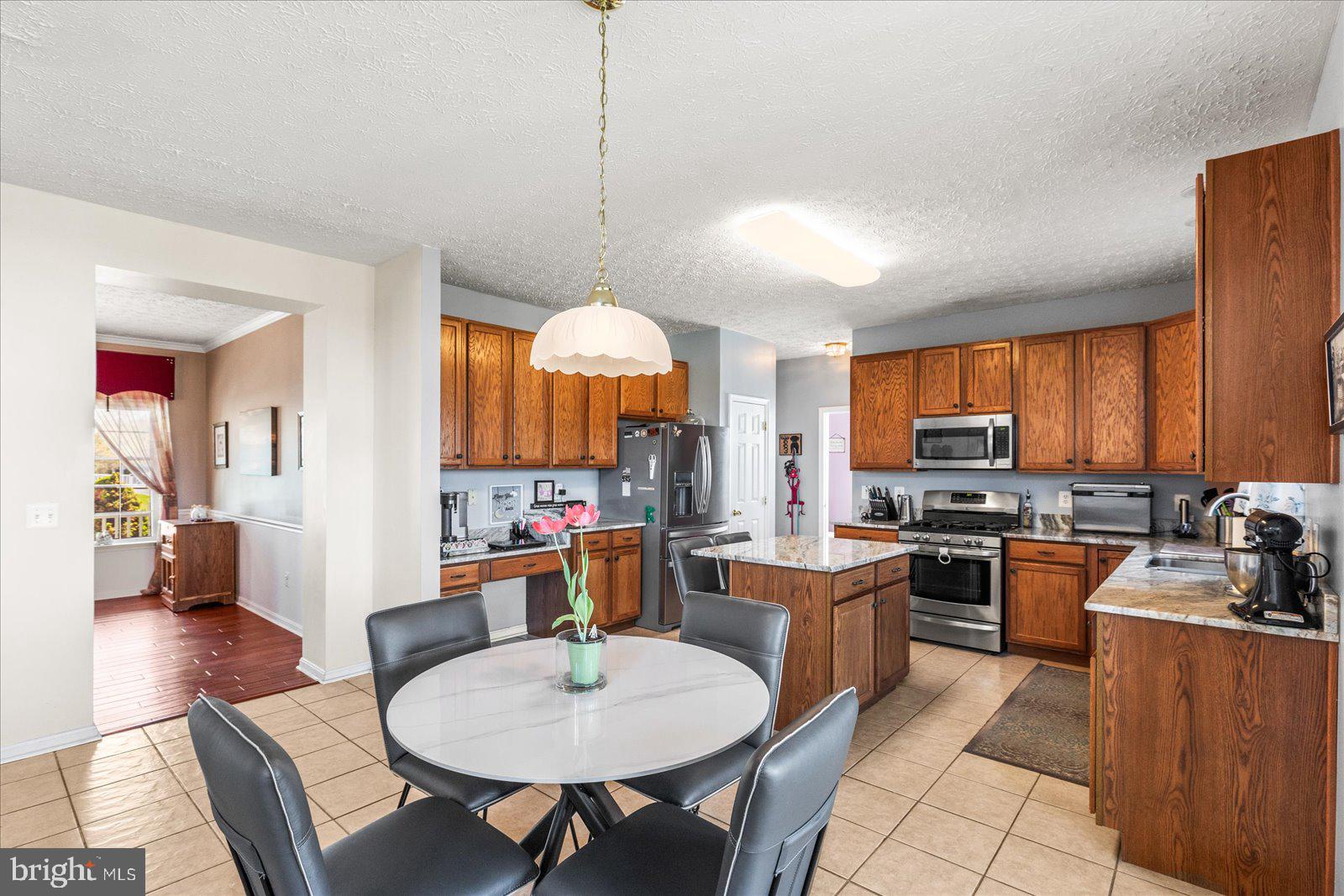 20 Sydney Drive Hanover, PA 17331 - Photo 25 of 73 a large kitchen with a table and chairs