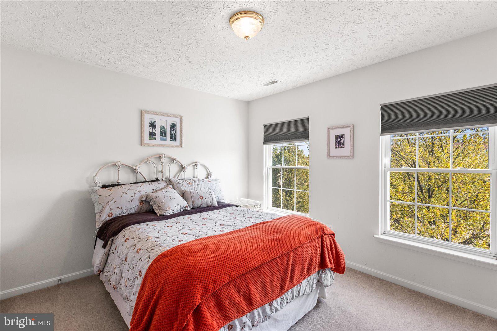 20 Sydney Drive Hanover, PA 17331 - Photo 49 of 73 a bed sitting in a bedroom next to a window