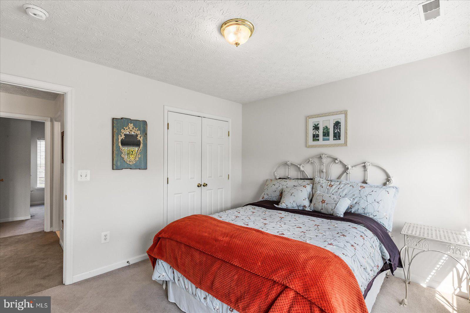 20 Sydney Drive Hanover, PA 17331 - Photo 50 of 73 a bedroom with a bed and painting on the wall