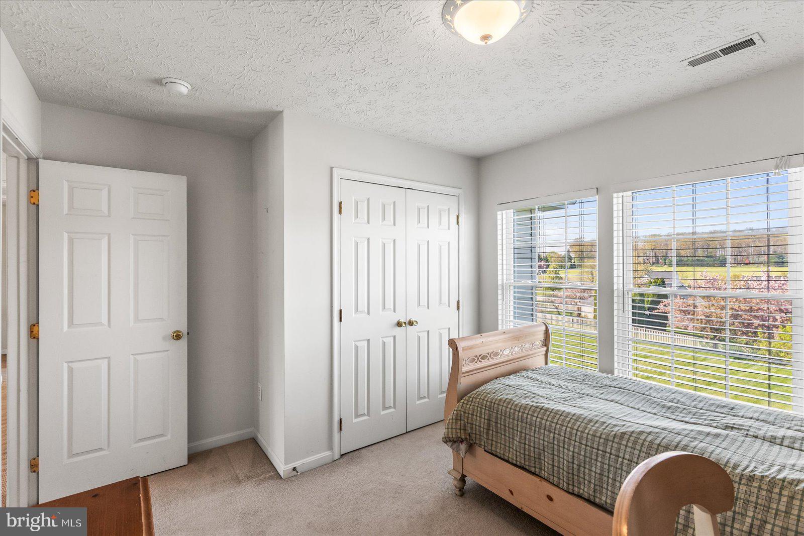20 Sydney Drive Hanover, PA 17331 - Photo 52 of 73 a bedroom with a bed and window