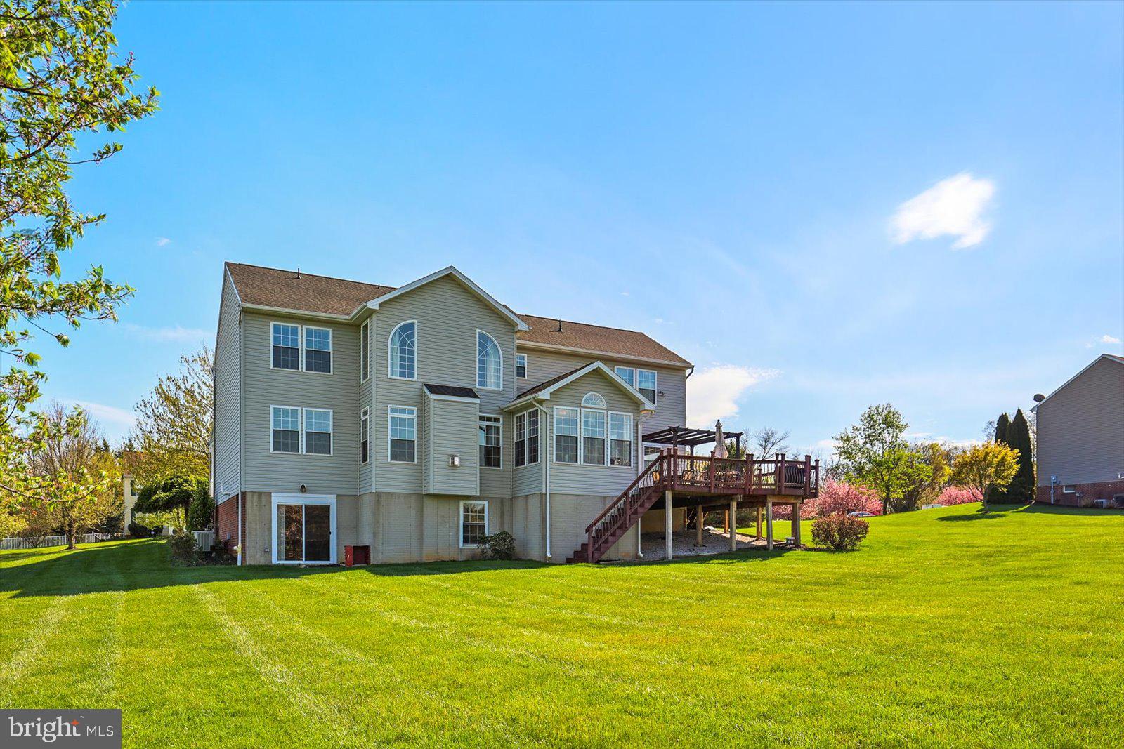 20 Sydney Drive Hanover, PA 17331 - Photo 67 of 73 a front view of house with yard and trees in the background