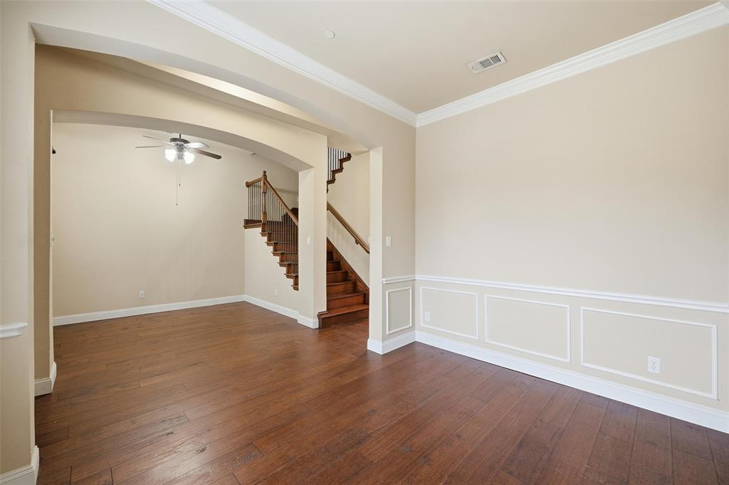 4673 Cecile Road Plano, TX 75024 - Photo 7 of 29 a view of an empty room with wooden floor