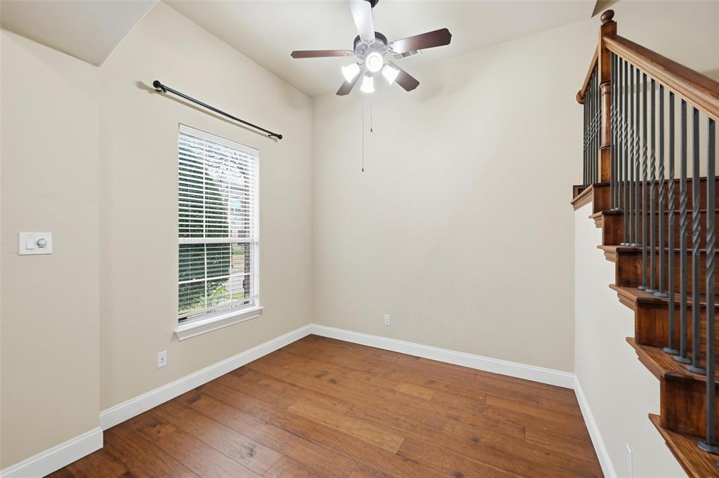 4673 Cecile Road Plano, TX 75024 - Photo 10 of 29 wooden floor in an empty room with a window