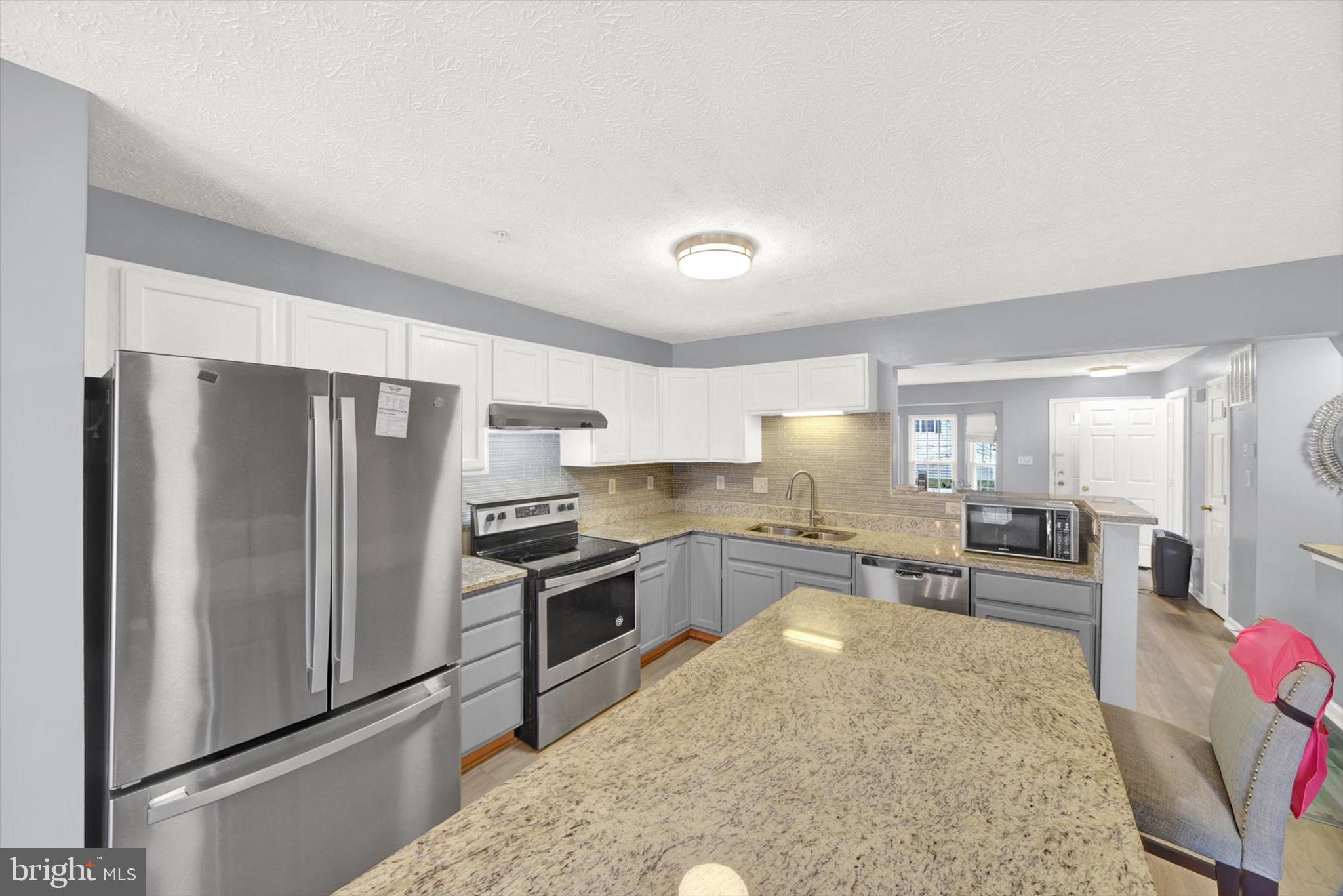 2579 Blue Water Boulevard Odenton, MD 21113 - Photo 10 of 32 HUGE Kitchen ISLAND w/ granite top!!