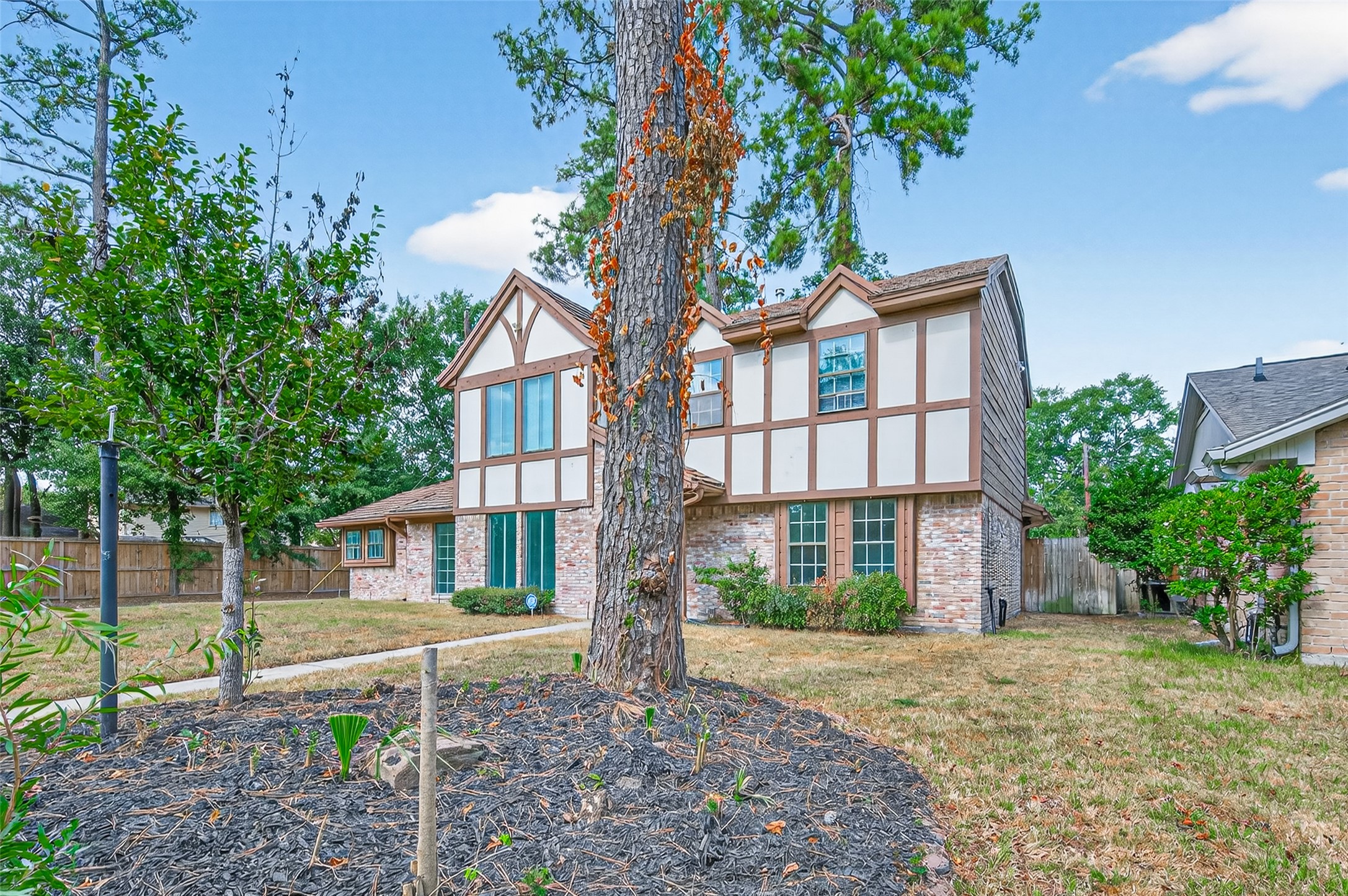 230 Black Forest Drive Spring, TX 77388 - Photo 6 of 43 front view of a house with a yard