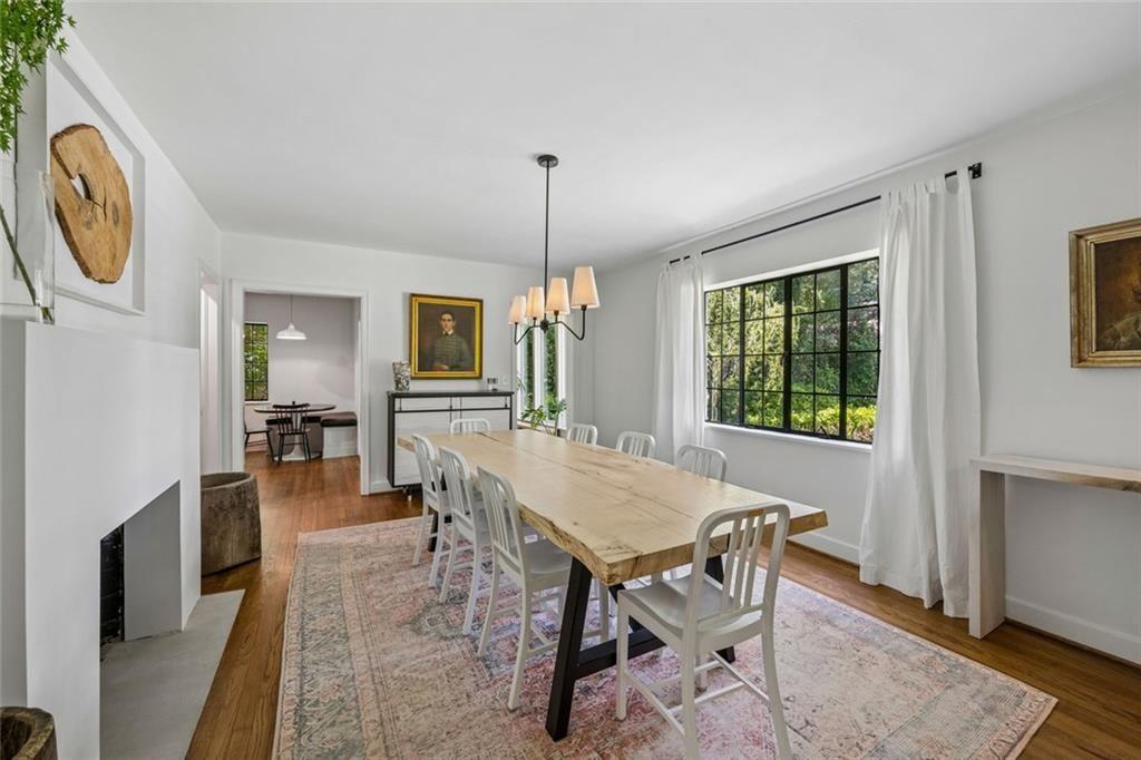 2069 Edinburgh Terrace Northeast Atlanta, GA 30307 - Photo 10 of 72 a view of a dining room with furniture window and wooden floor
