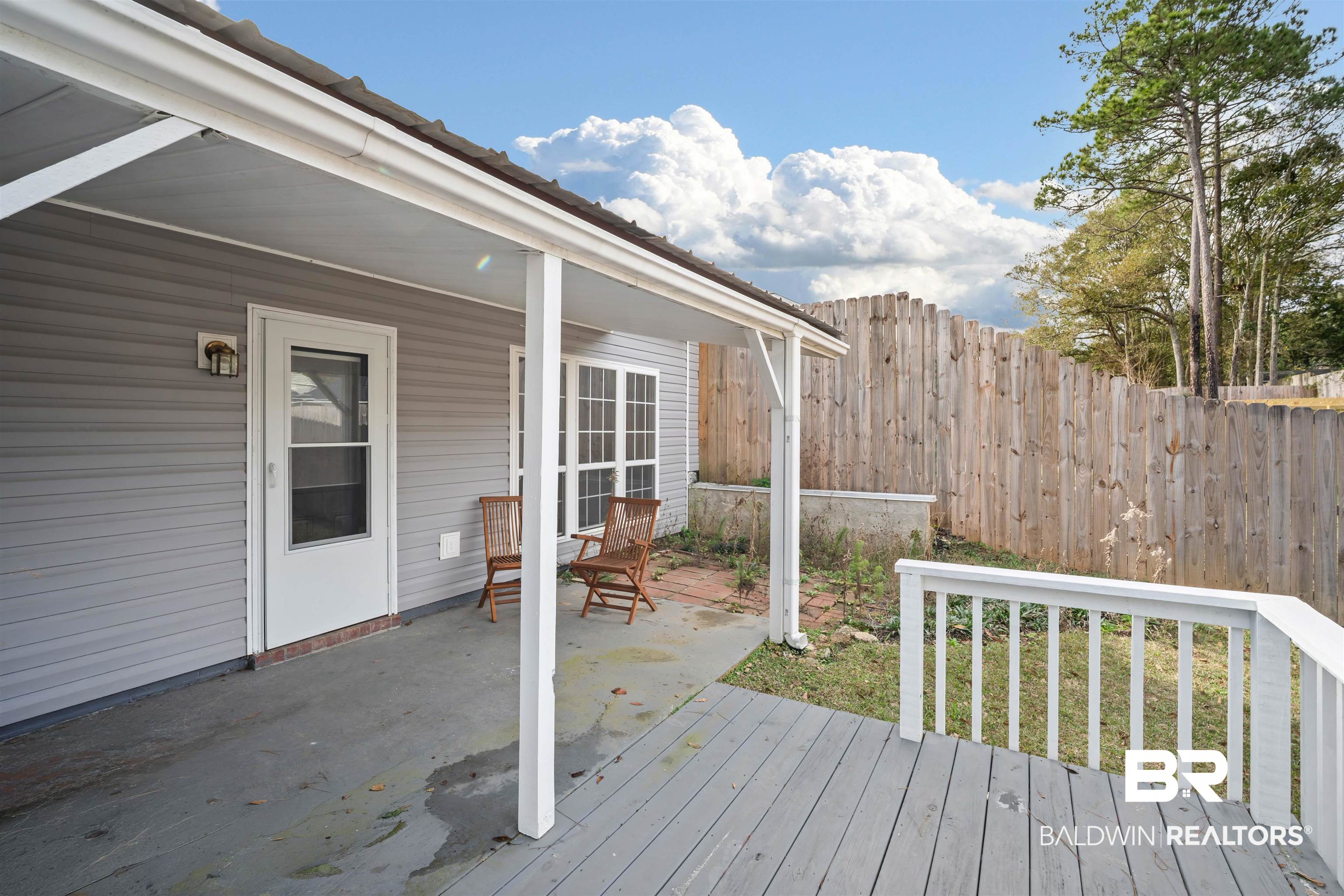 250 North Spring Lake Drive Mobile, AL 36695 - Photo 27 of 29 Extended wood deck, some new along with some of the fencing.