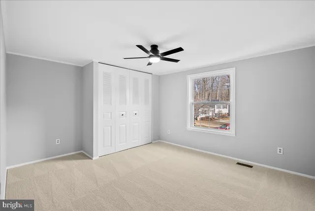 a bathroom with a sink a vanity and a bathtub