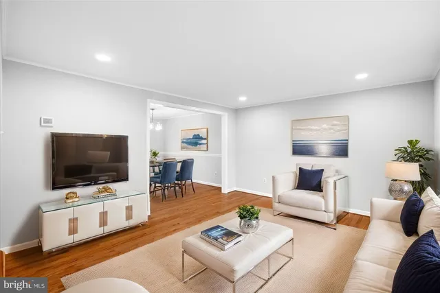 a kitchen with stainless steel appliances granite countertop wooden cabinets and a stove top oven