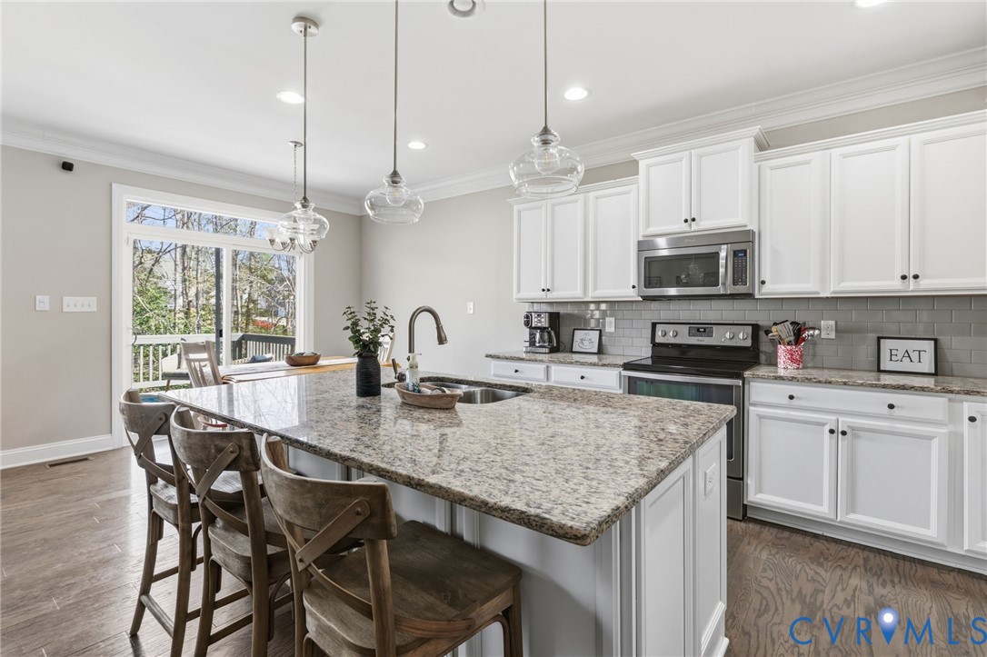 15206 Blackrail Road Chesterfield, VA 23832 - Photo 16 of 54 Large kitchen island with room for barstools, pend