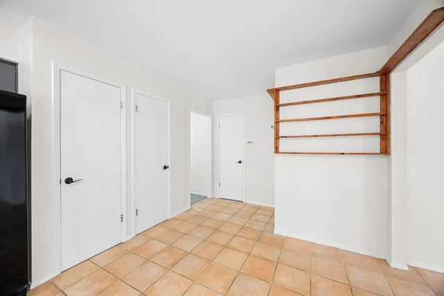 a view of a room with an empty space