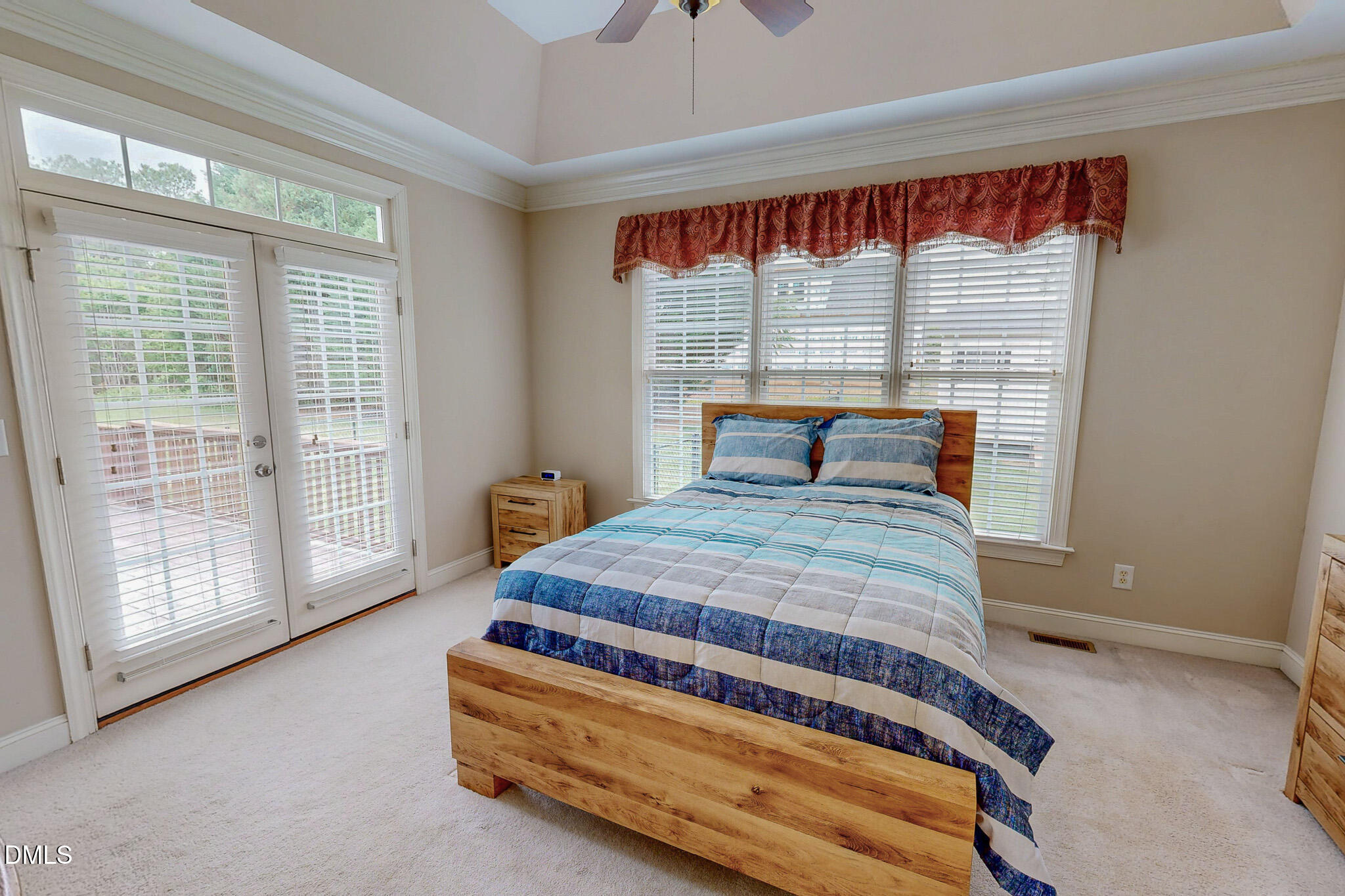 115 Duncan Plantation Road Timberlake, NC 27583 - Photo 12 of 48 a bedroom with a bed and window