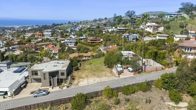 an aerial view of a city with lots of residential buildings
