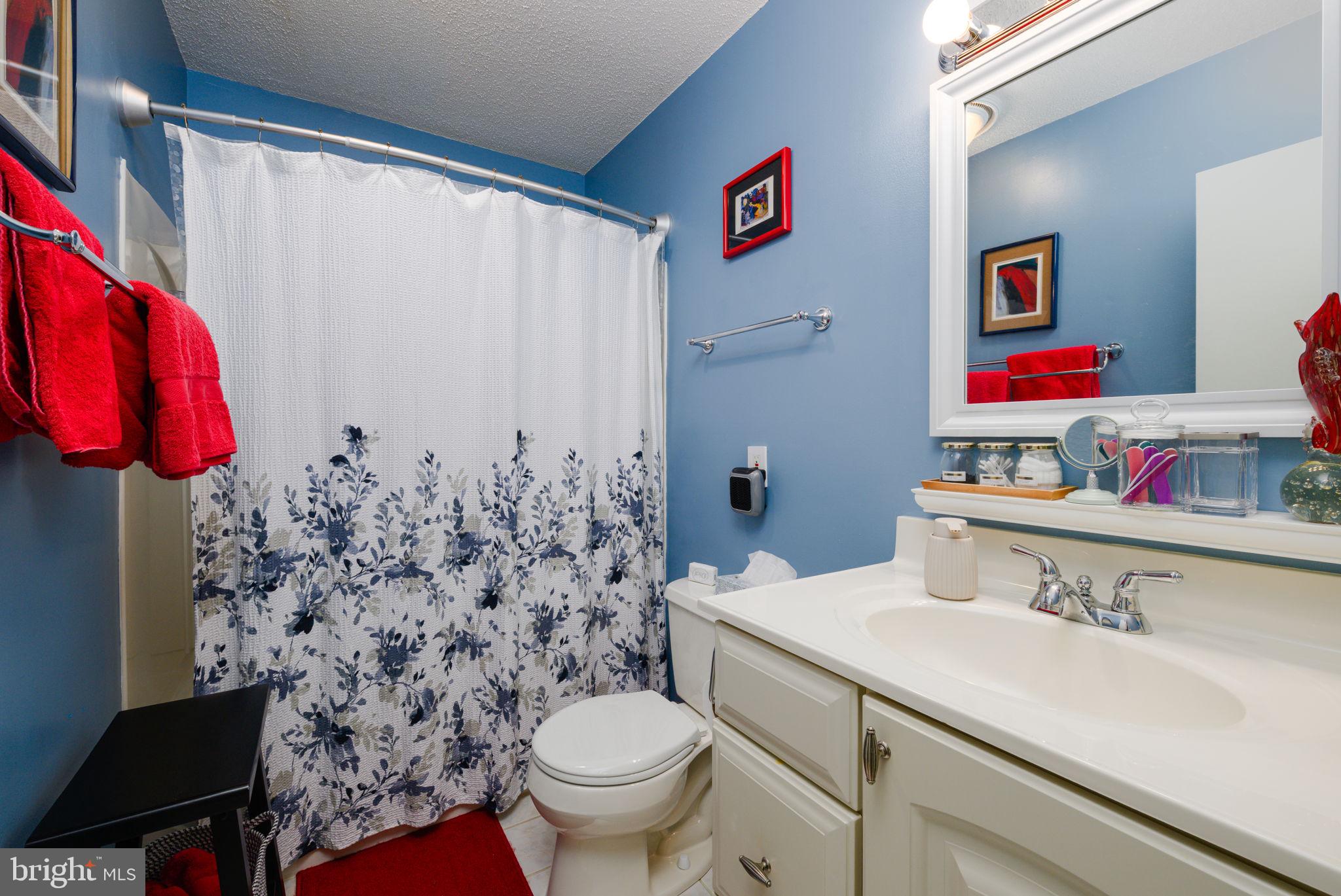 10 Gloucester Road Ocean Pines, MD 21811 - Photo 9 of 37 a bathroom with a sink and a toilet