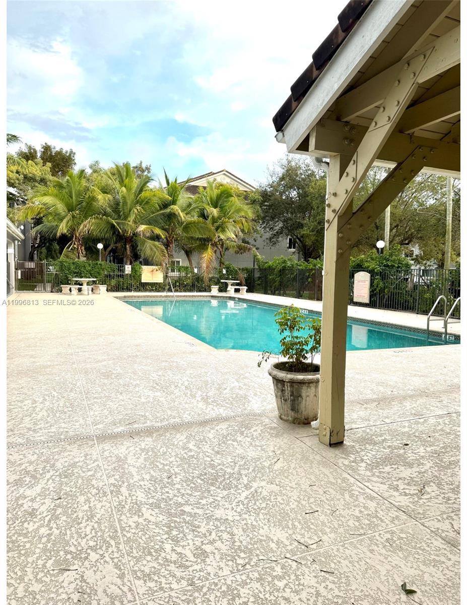 15480 Southwest 284th Street, Unit 2307 Homestead, FL 33033 - Photo 18 of 19 a view of a backyard