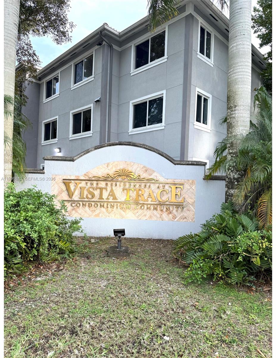 15480 Southwest 284th Street, Unit 2307 Homestead, FL 33033 - Photo 3 of 19 a view of a house with a yard