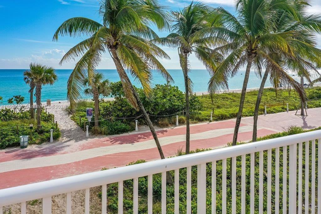 5401 Collins Avenue, Unit 1123 Miami Beach, FL 33140 - Photo 12 of 38 a view of balcony with a palm tree