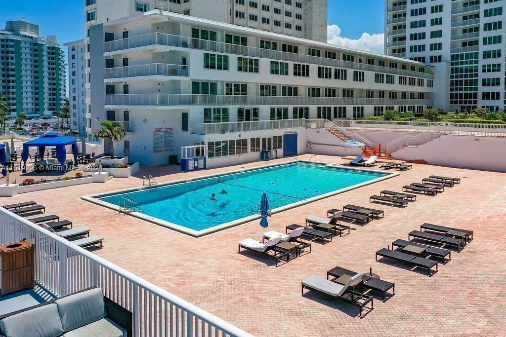 5401 Collins Avenue, Unit 1123 Miami Beach, FL 33140 - Photo 6 of 38 a front view of a building with outdoor space