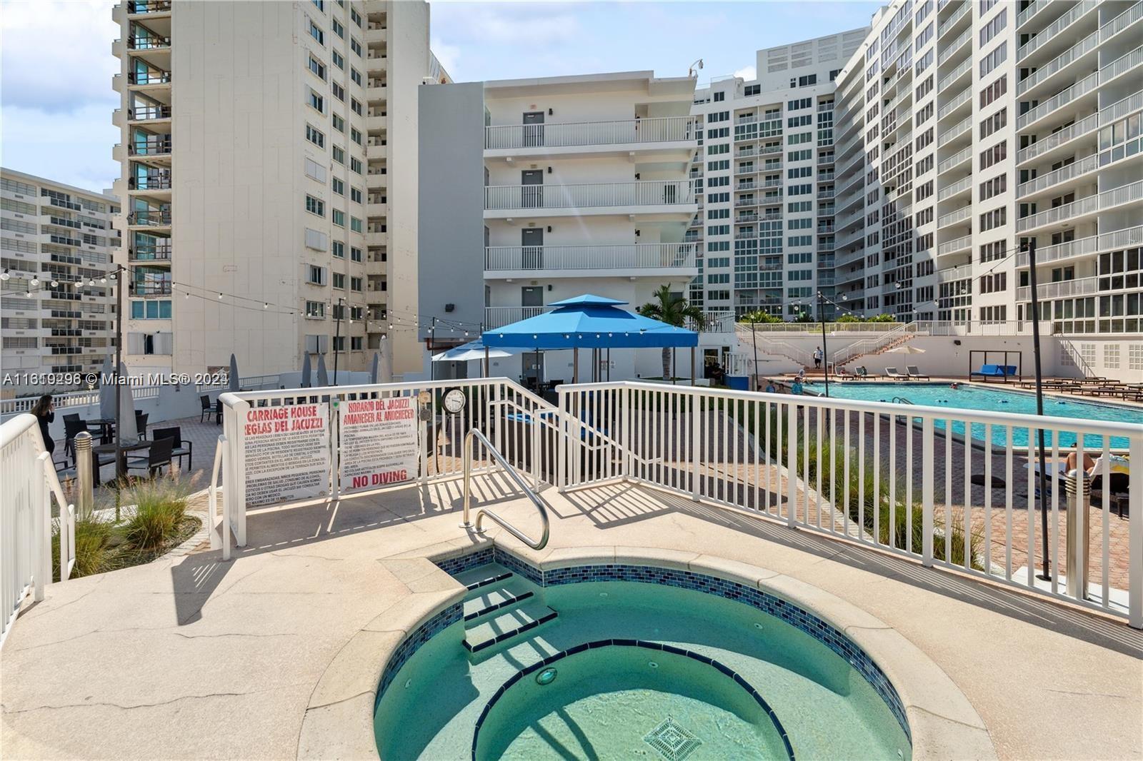 5401 Collins Avenue, Unit 1123 Miami Beach, FL 33140 - Photo 10 of 38 a view of balcony with a swimming pool