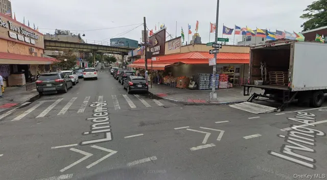a view of street with parked cars