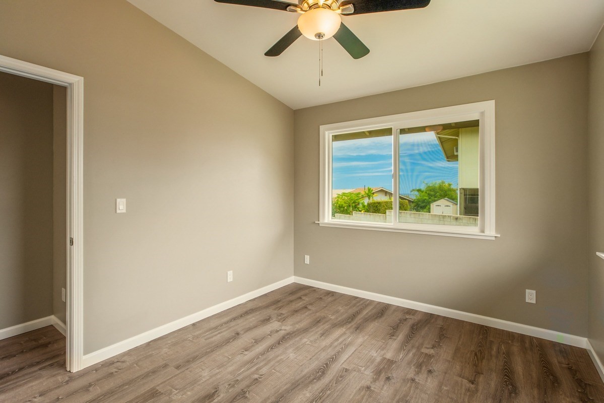 4722 Mailihuna Road Kapaa, HI 96746 - Photo 15 of 22 a view of an empty room with a window