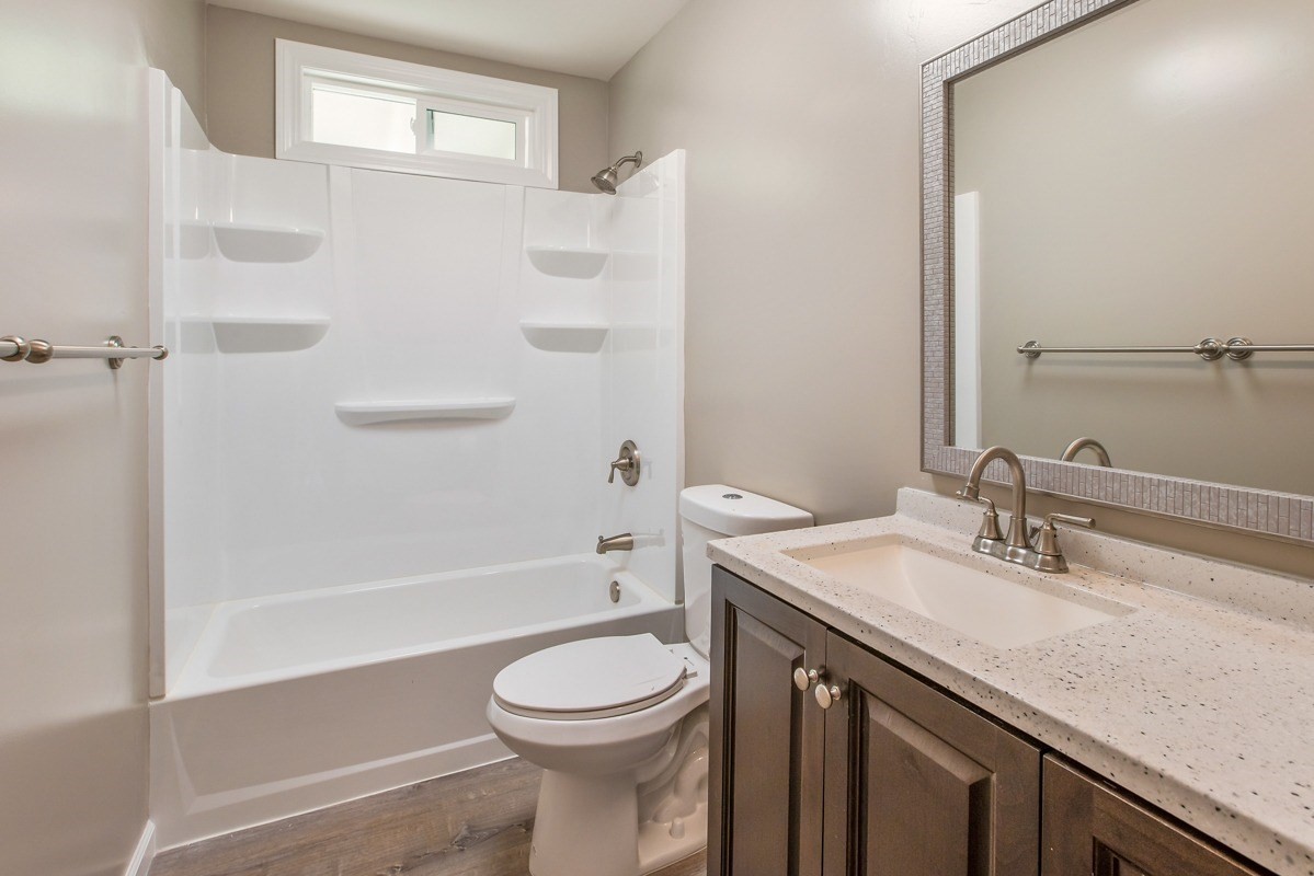 4722 Mailihuna Road Kapaa, HI 96746 - Photo 16 of 22 a bathroom with a sink a toilet and shower