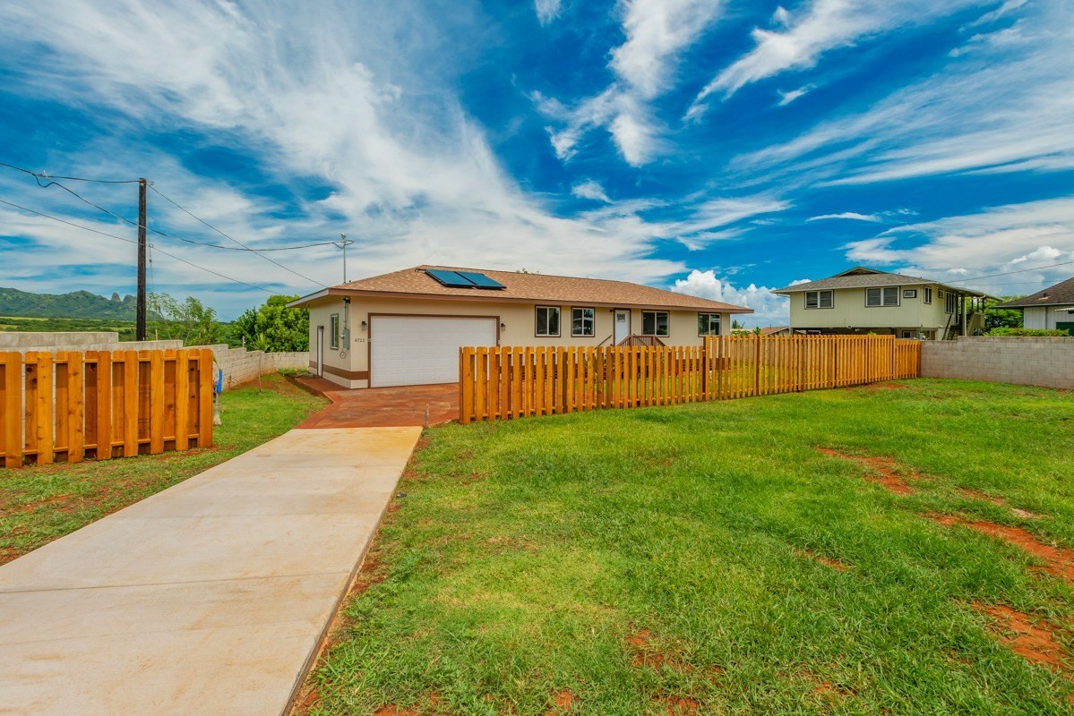 4722 Mailihuna Road Kapaa, HI 96746 - Photo 21 of 22 a view of a house with a yard