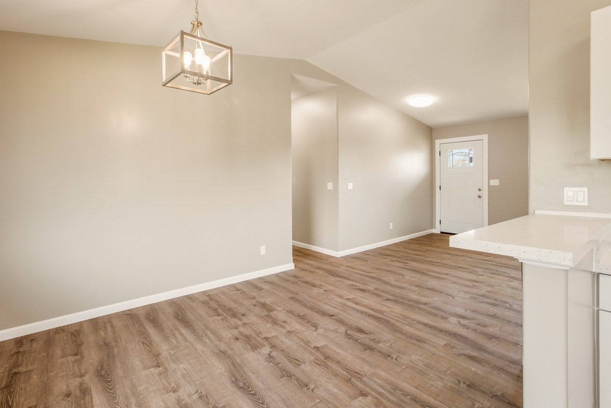 4722 Mailihuna Road Kapaa, HI 96746 - Photo 6 of 22 a view of empty room with wooden floor
