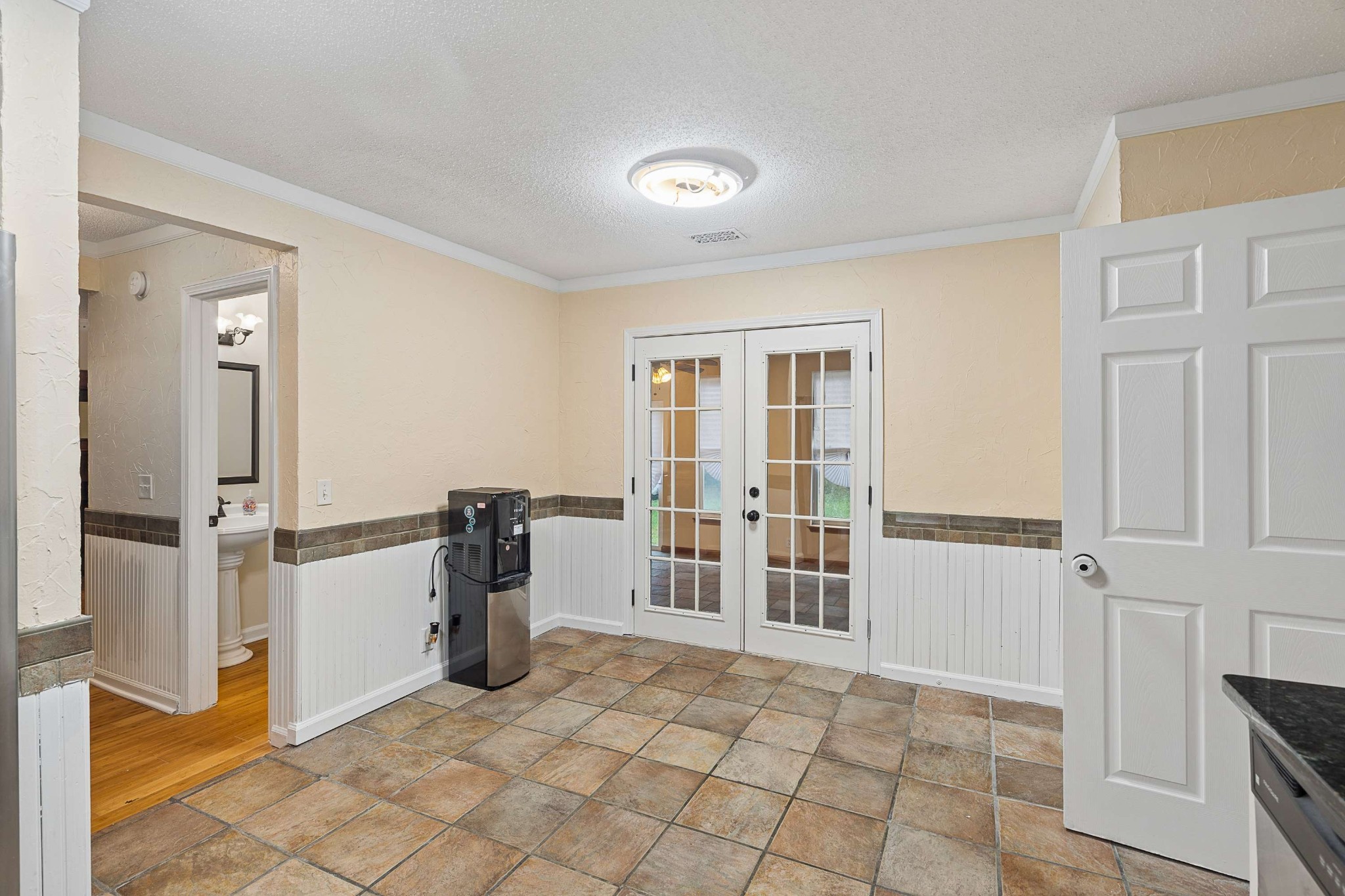 3332 Towne Village Road Antioch, TN 37013 - Photo 12 of 30 a view of a kitchen with refrigerator and furniture