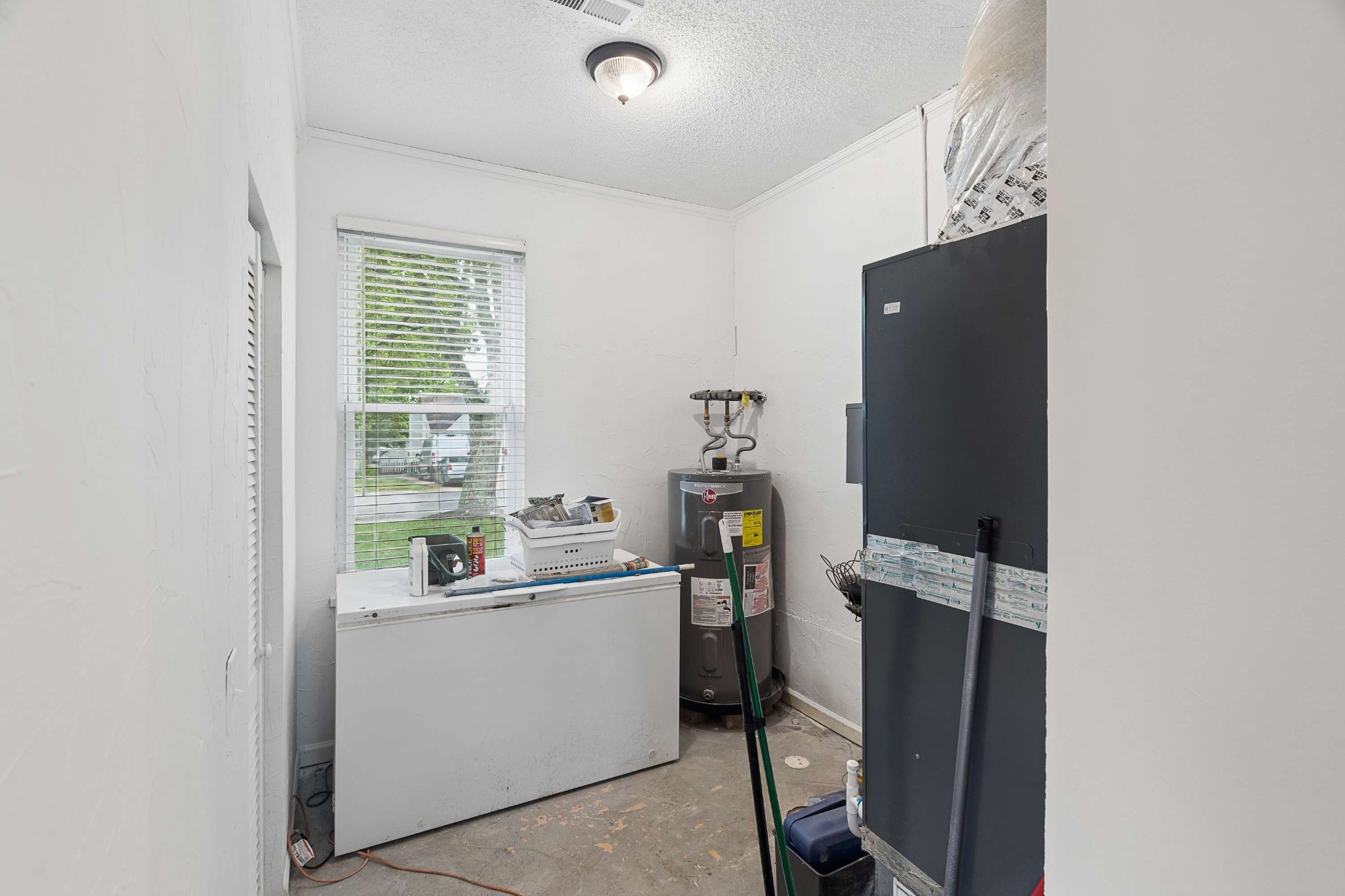 3332 Towne Village Road Antioch, TN 37013 - Photo 16 of 30 a room with storage and utility