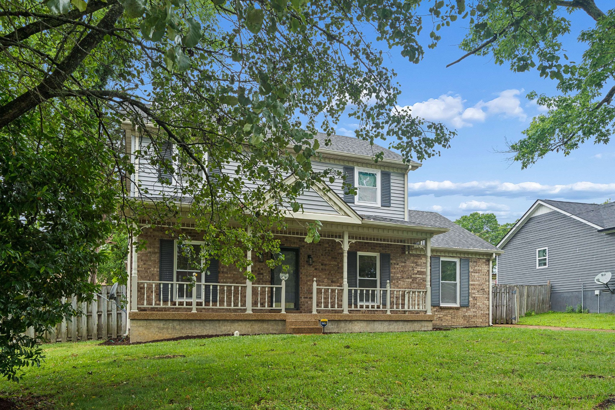3332 Towne Village Road Antioch, TN 37013 - Photo 2 of 30 front view of a house with a yard