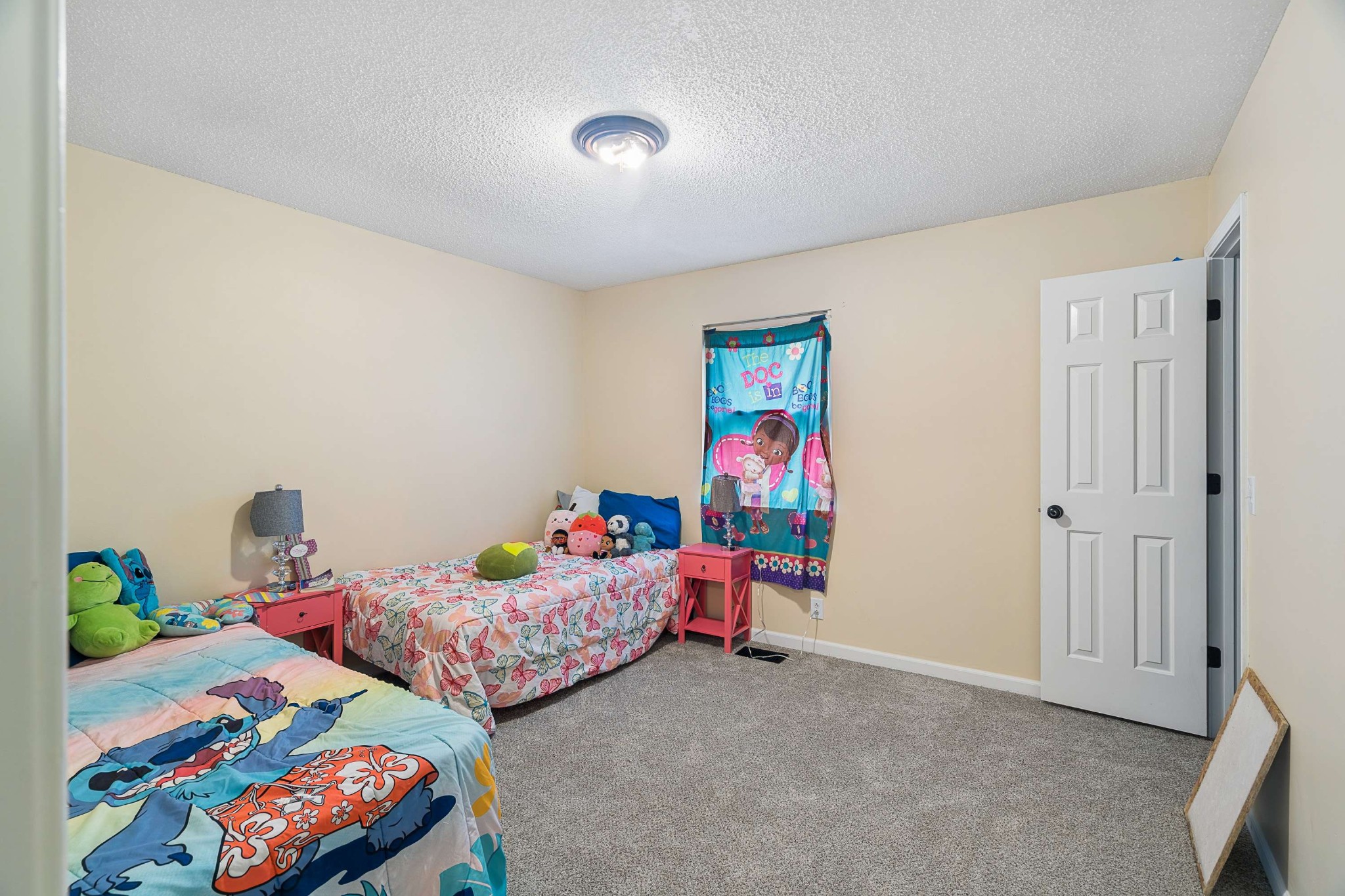 3332 Towne Village Road Antioch, TN 37013 - Photo 22 of 30 a bedroom with two beds and a couch