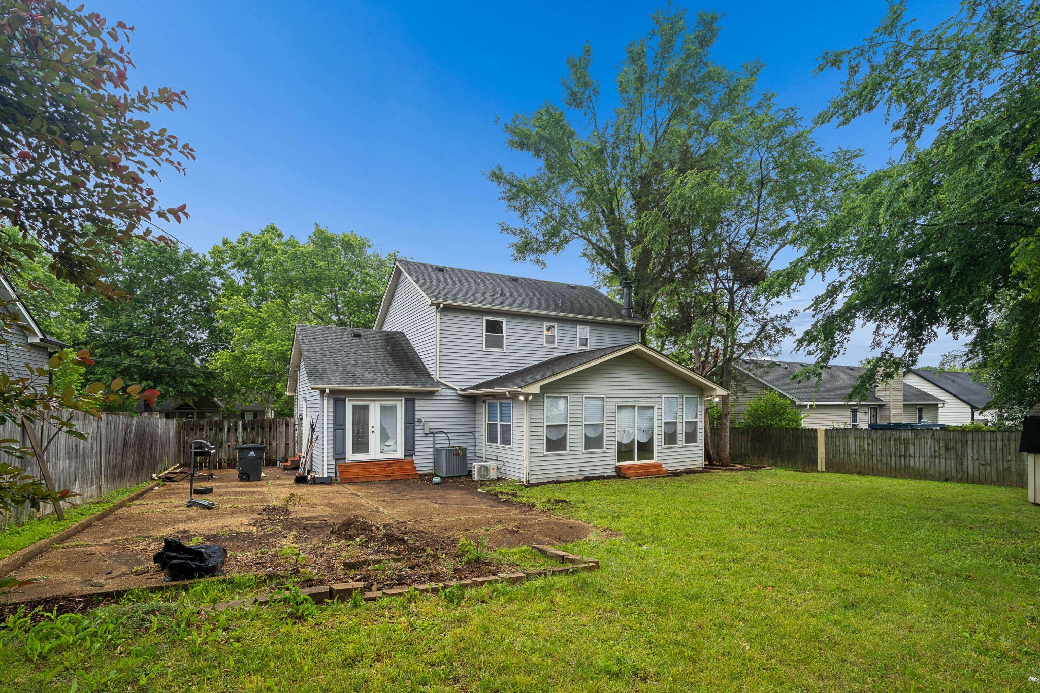 3332 Towne Village Road Antioch, TN 37013 - Photo 26 of 30 a view of house that has a big yard with large trees