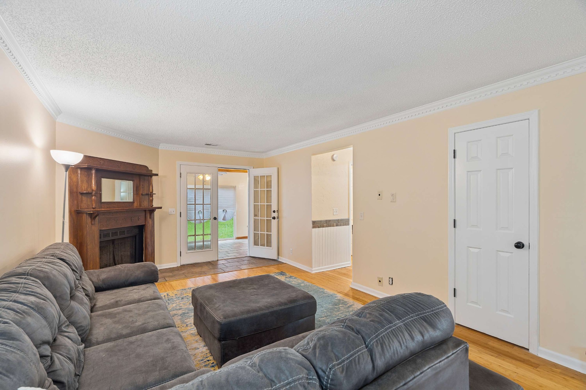 3332 Towne Village Road Antioch, TN 37013 - Photo 5 of 30 a living room with furniture and a fireplace