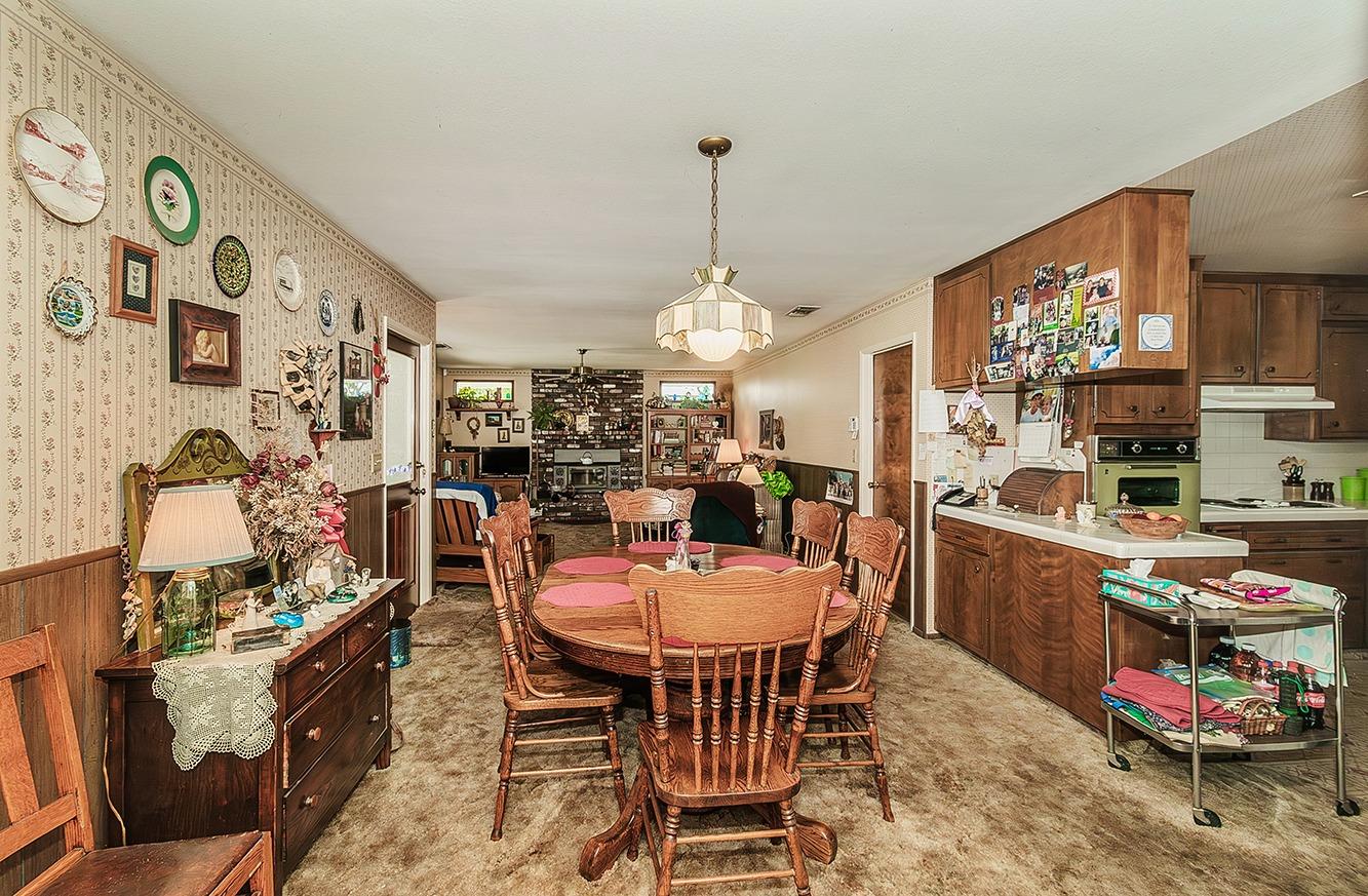 596 West Herbert Avenue Reedley, CA 93654 - Photo 14 of 30 a dining room with furniture and window