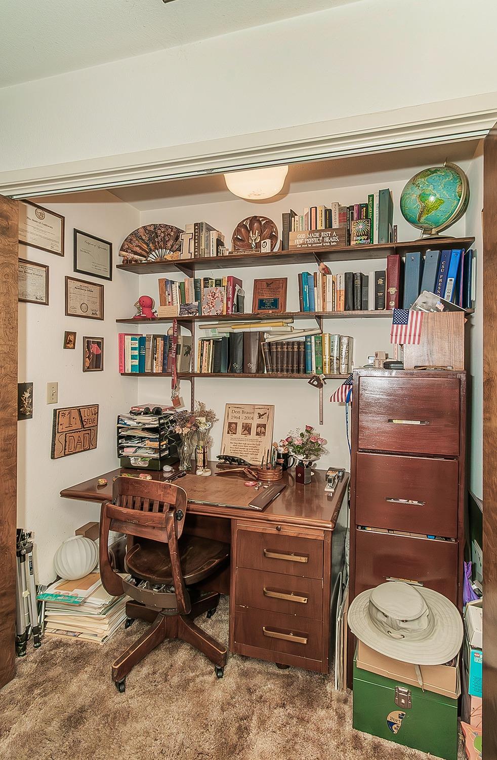 596 West Herbert Avenue Reedley, CA 93654 - Photo 19 of 30 a bathroom with a toilet a sink and a mirror