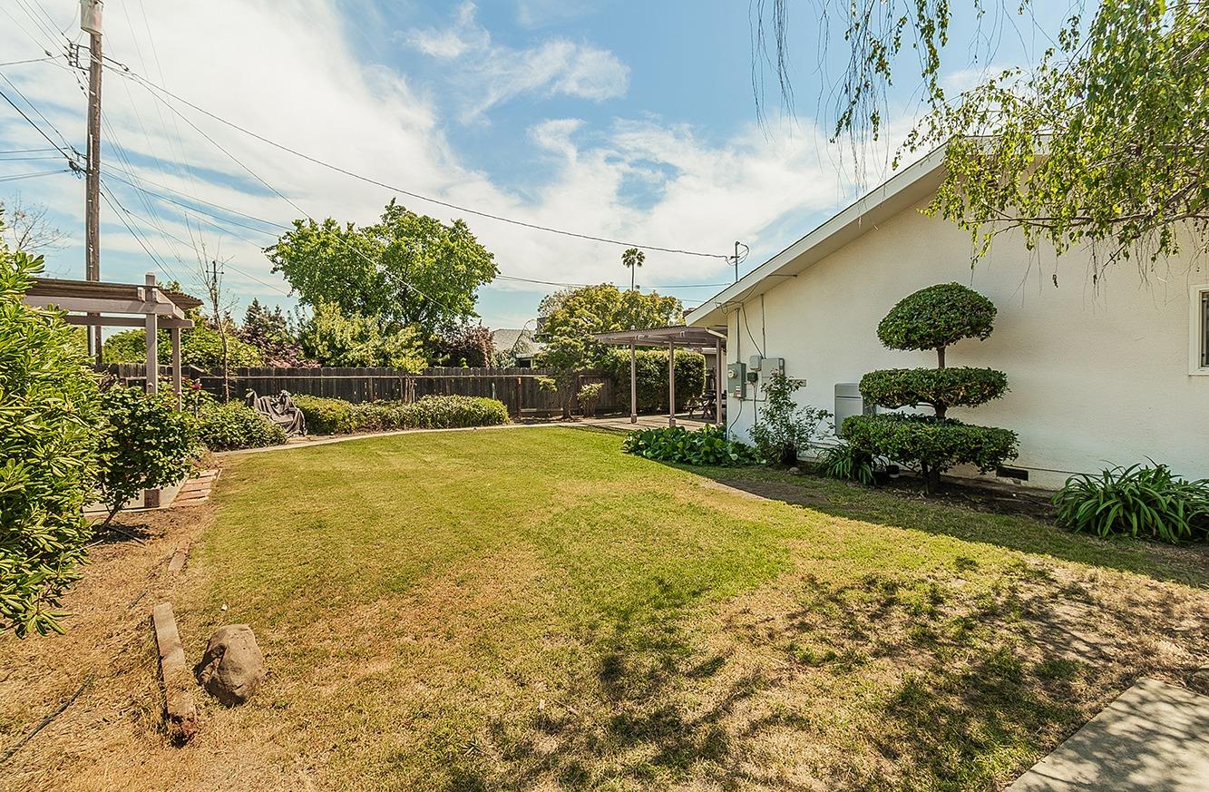 596 West Herbert Avenue Reedley, CA 93654 - Photo 29 of 30 a view of backyard of the house