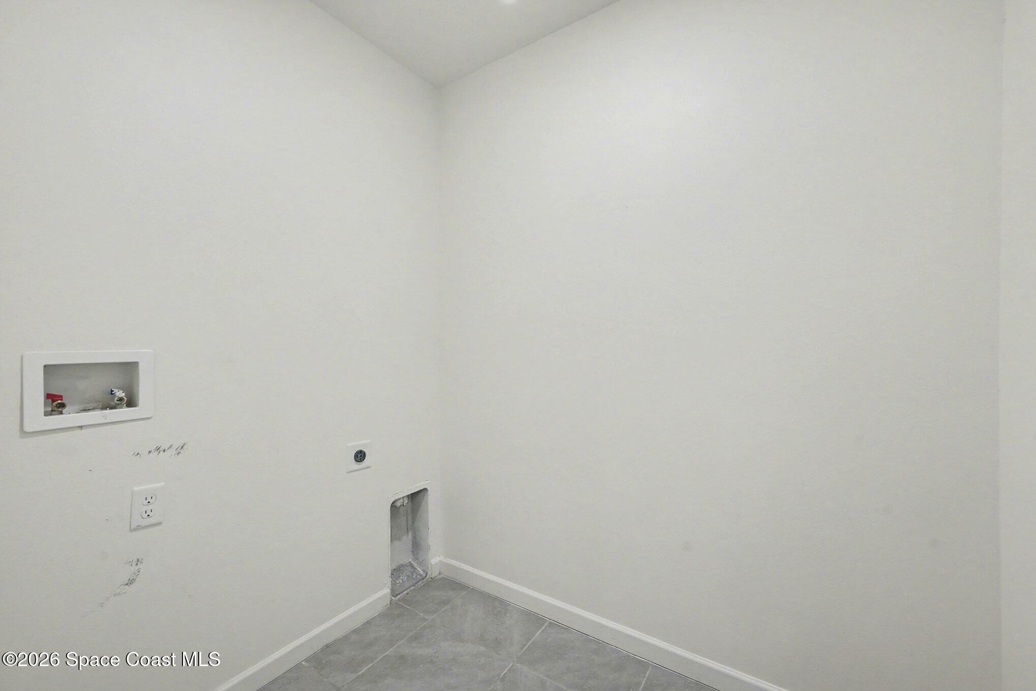 5092 Talbot Boulevard Cocoa, FL 32926 - Photo 25 of 32 Second Floor Laundry Room