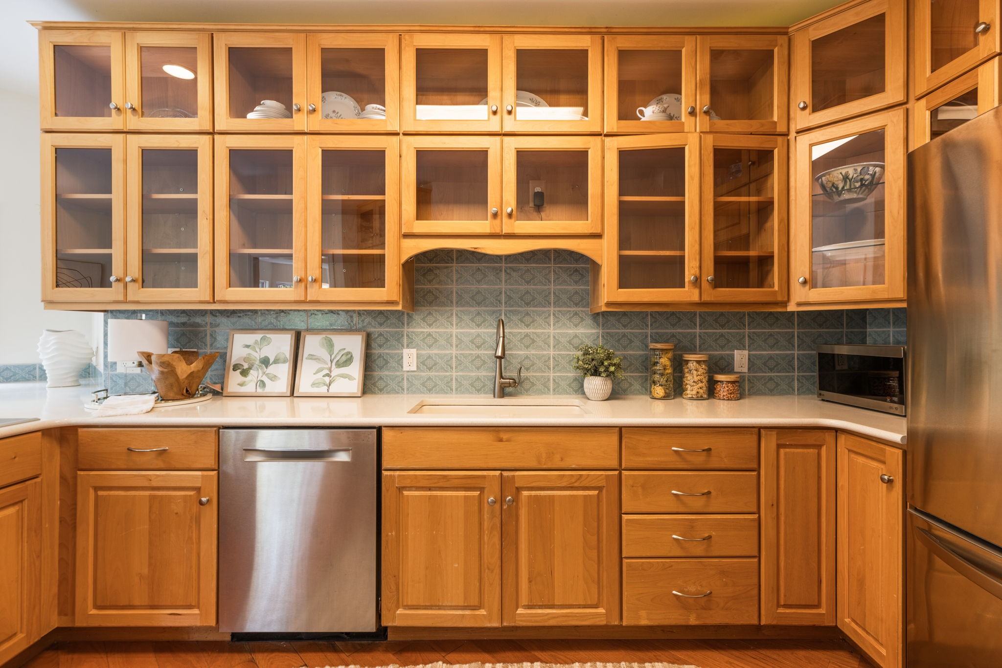 8013 Boone Trace Nashville, TN 37221 - Photo 14 of 34 a kitchen with stainless steel appliances granite countertop a sink and cabinets