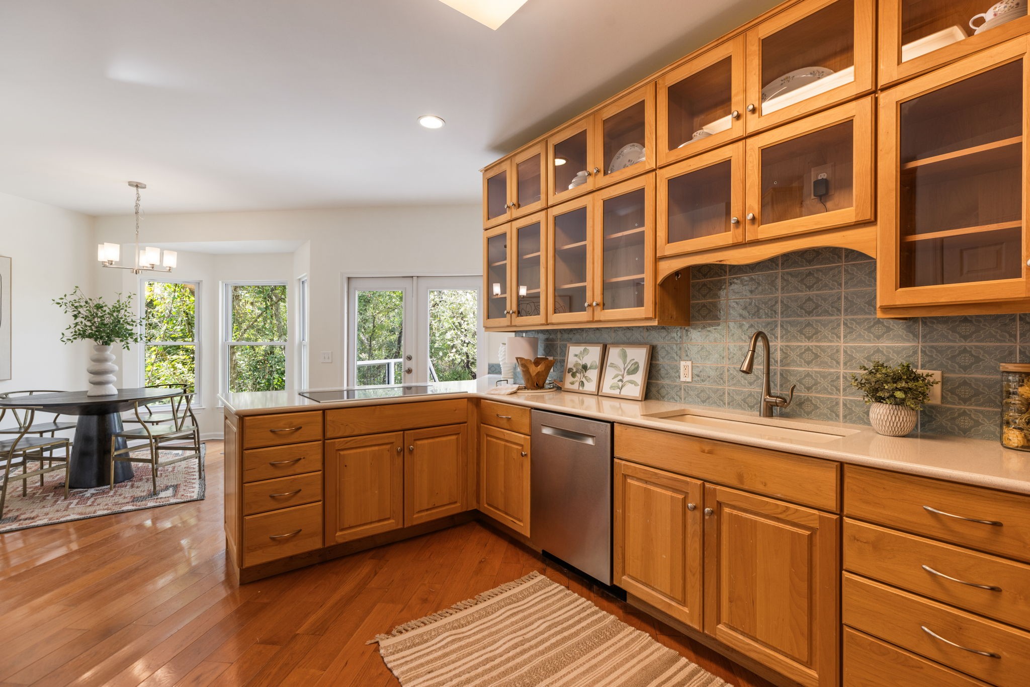8013 Boone Trace Nashville, TN 37221 - Photo 15 of 34 a kitchen with stainless steel appliances granite countertop a sink and cabinets