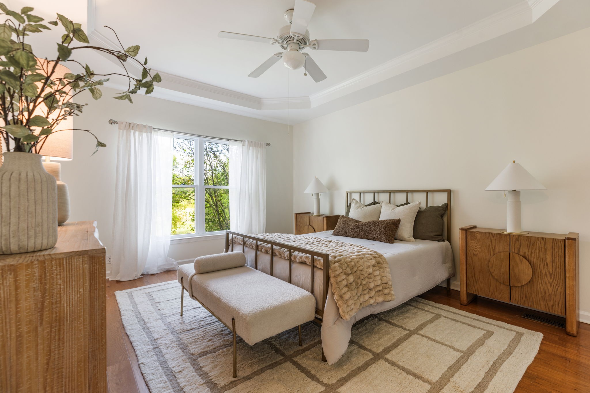 8013 Boone Trace Nashville, TN 37221 - Photo 16 of 34 a bedroom with a bed and a couch