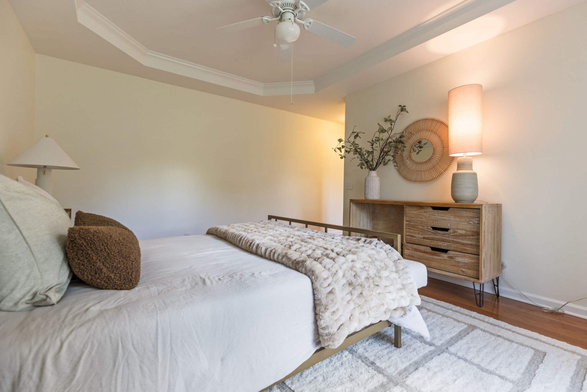 8013 Boone Trace Nashville, TN 37221 - Photo 17 of 34 a bedroom with a bed and a chandelier