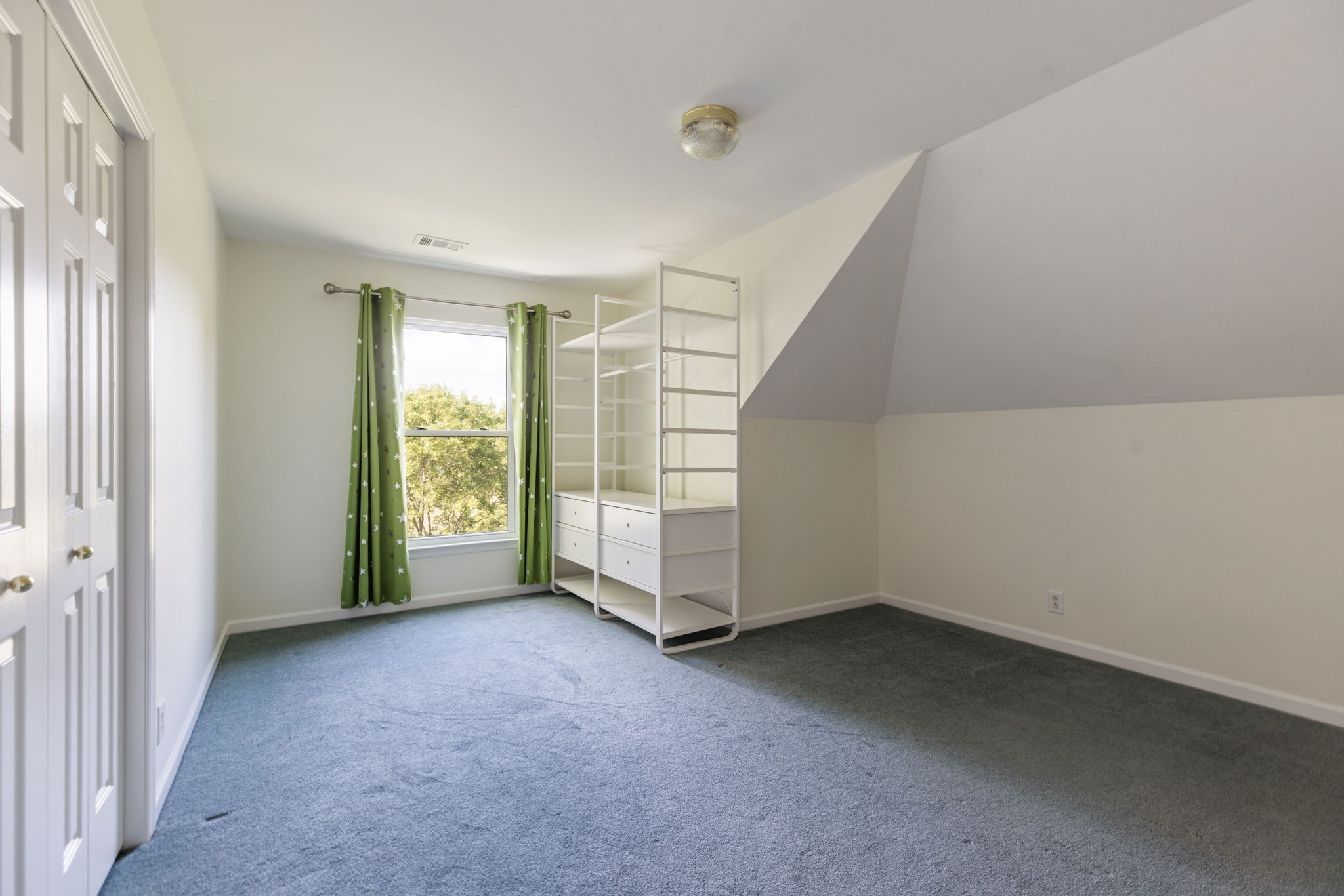 8013 Boone Trace Nashville, TN 37221 - Photo 23 of 34 a view of a big room with windows and chandelier fan