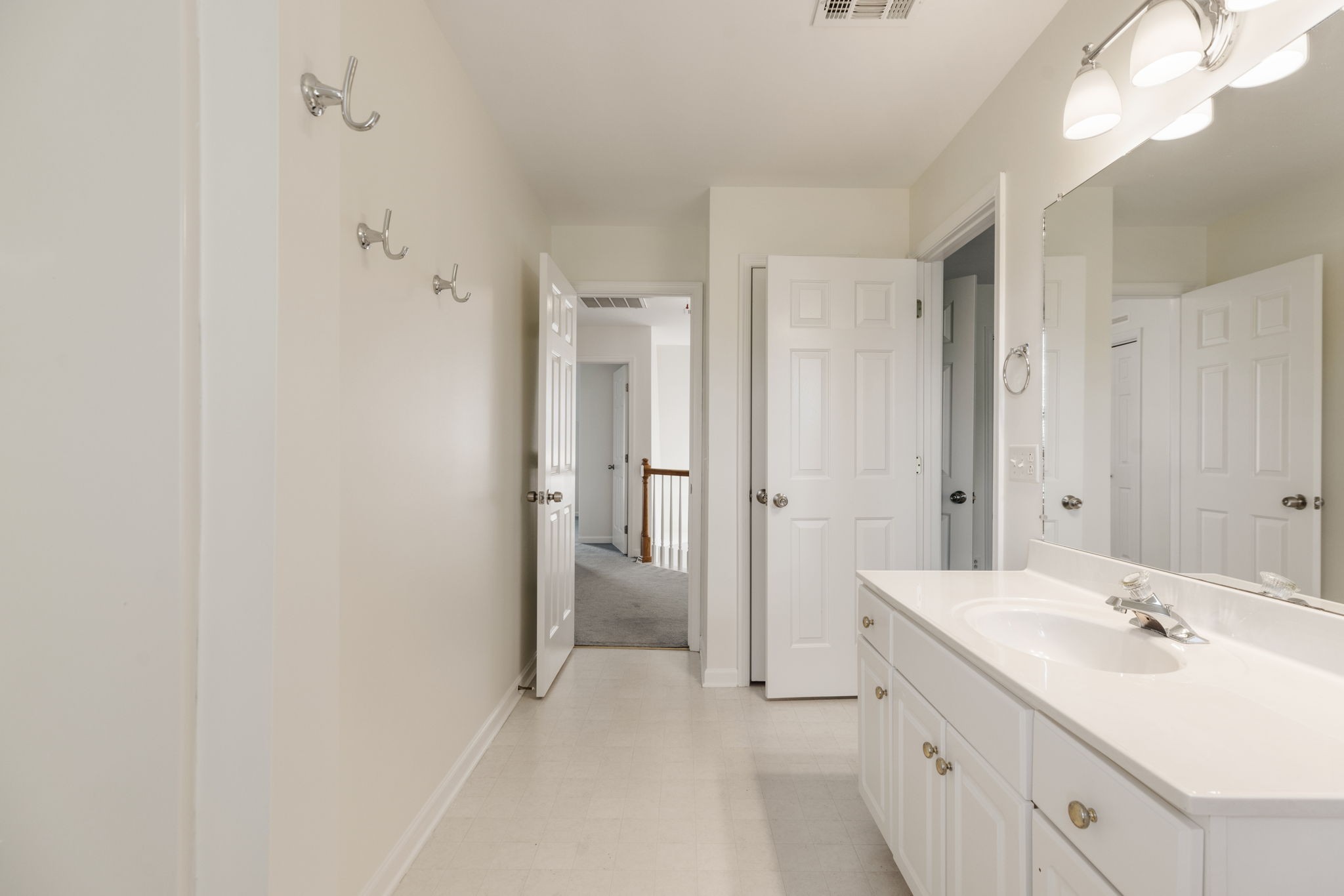 8013 Boone Trace Nashville, TN 37221 - Photo 25 of 34 a bathroom with a sink a mirror and a shower