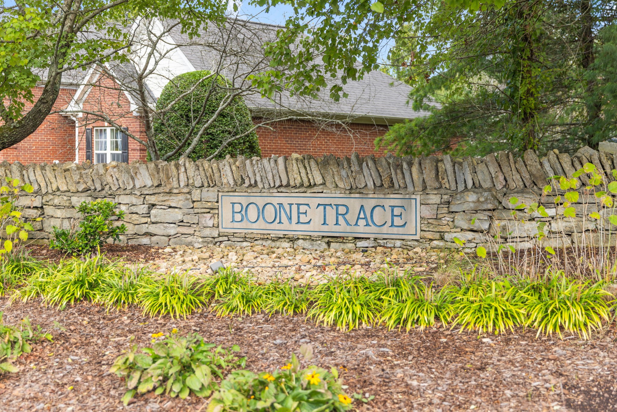 8013 Boone Trace Nashville, TN 37221 - Photo 30 of 34 a sign on the side of the road