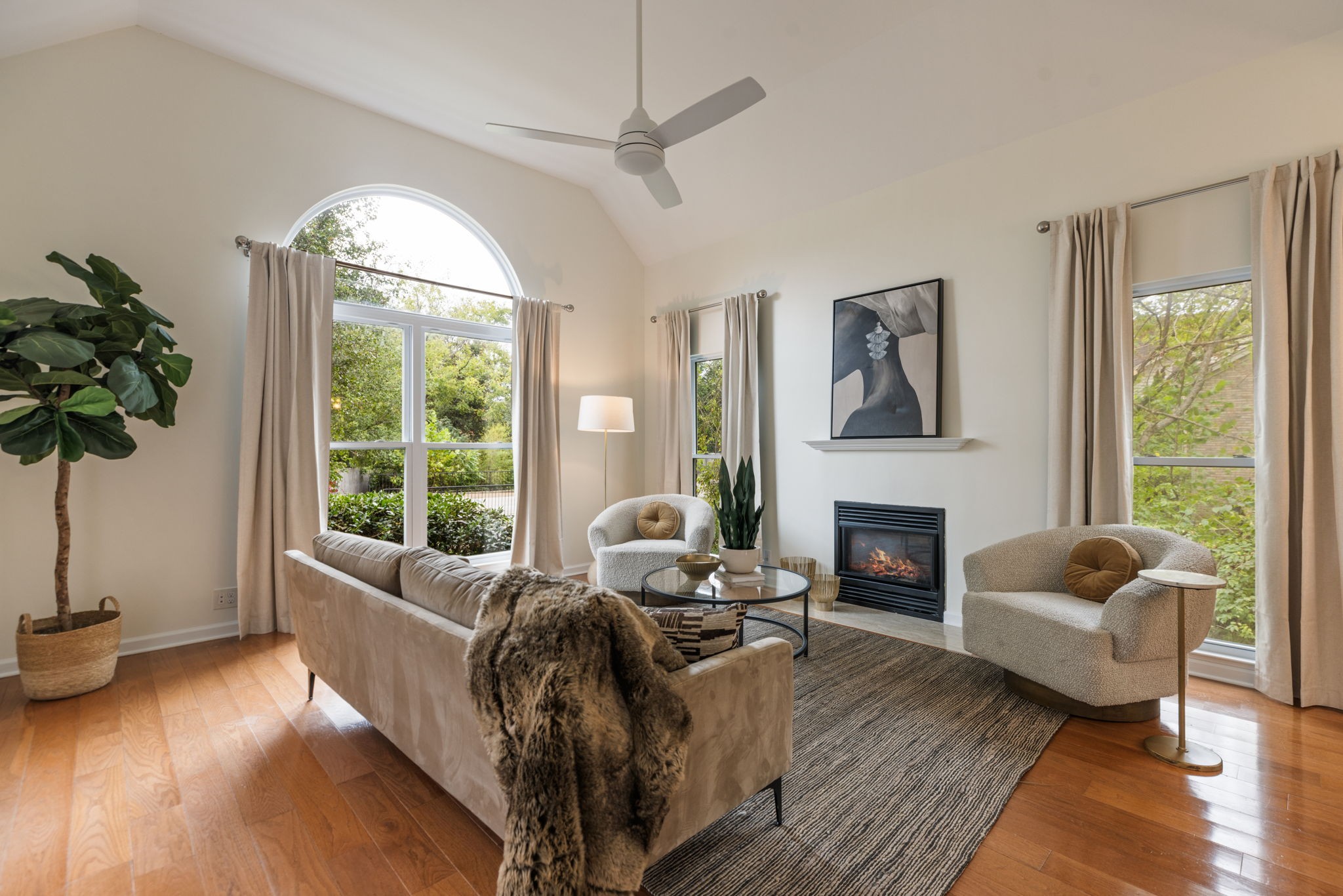 8013 Boone Trace Nashville, TN 37221 - Photo 4 of 34 a living room with furniture and a fireplace