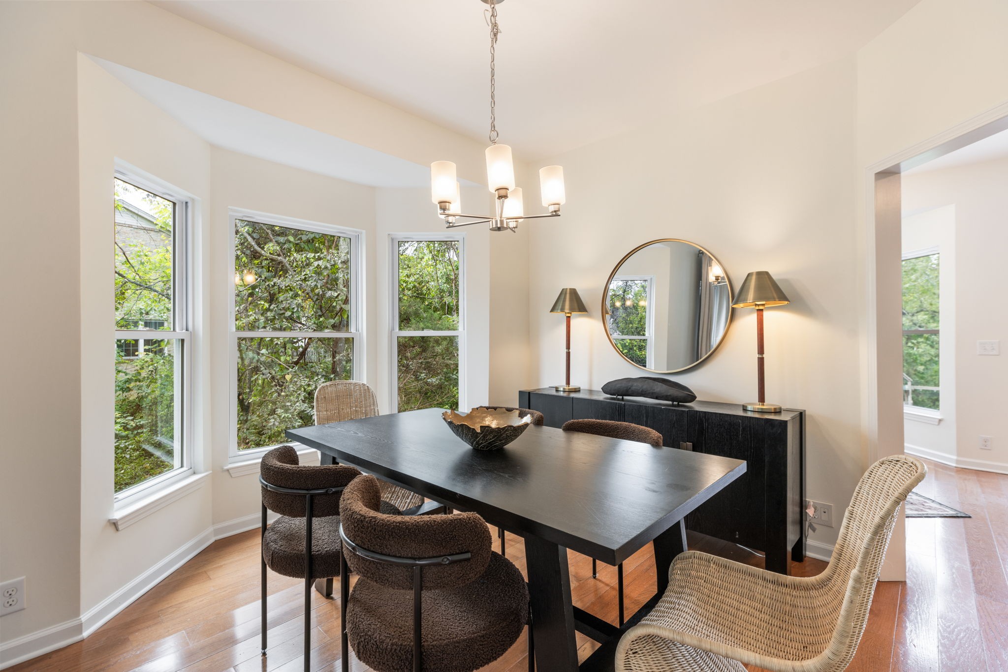 8013 Boone Trace Nashville, TN 37221 - Photo 10 of 34 a dining room with furniture a chandelier and wooden floor