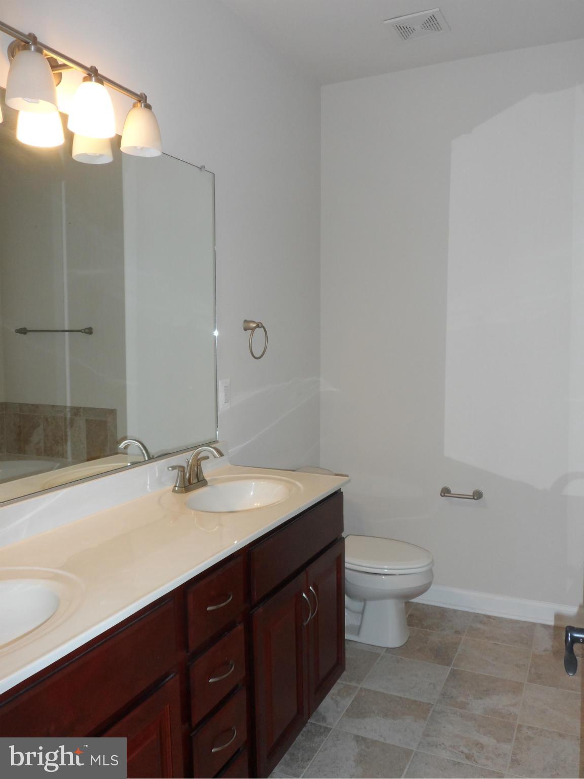 7409 Rixey Road King George, VA 22485 - Photo 11 of 18 Dual Vanities - Tile Floor