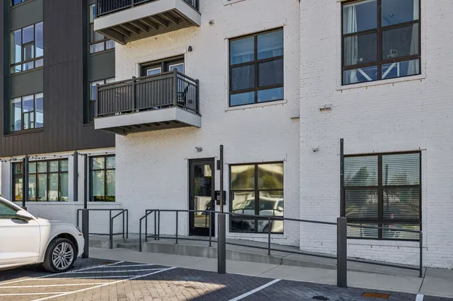 a car parked in front of a building